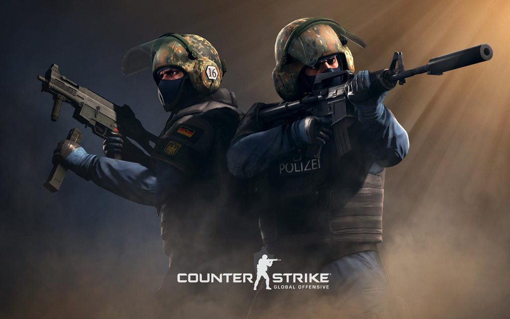 Capa do jogo Counter Strike Global Offensive com dois personagens de capacete e colete empunhando armas de fogo.