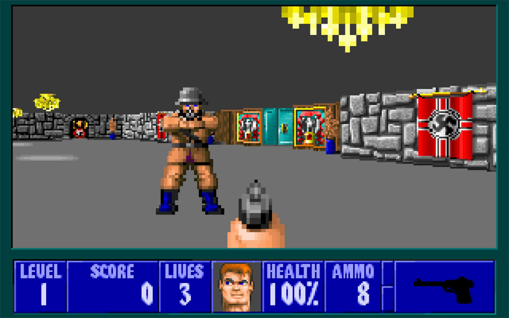 Tela do jogo Wolfeinstein 3D de 1992 com a visão em primeira pessoa, as barras de status e um inimigo na frente, sendo um dos pioneiros dos jogos FPS.