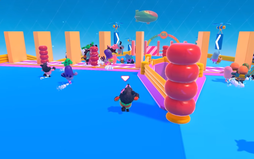 Imagem do jogo Fall Guys com o personagem vestido de lobo correndo na corrida de obstáculos.