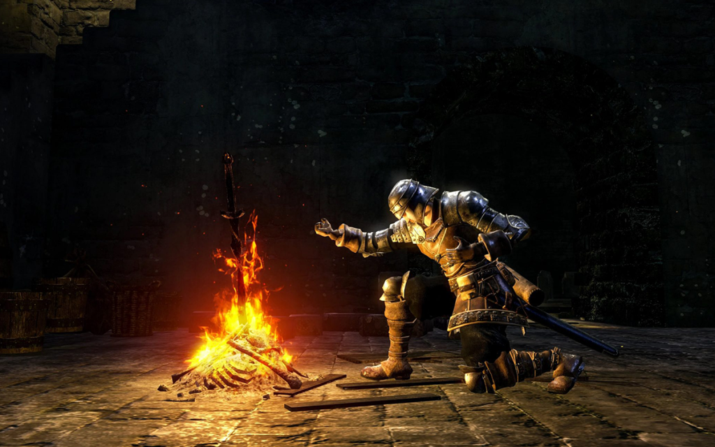 Imagem de jogo da franquia Dark Souls com o personagem principal descansando ao lado de uma fogueira representando um jogo soulslike.